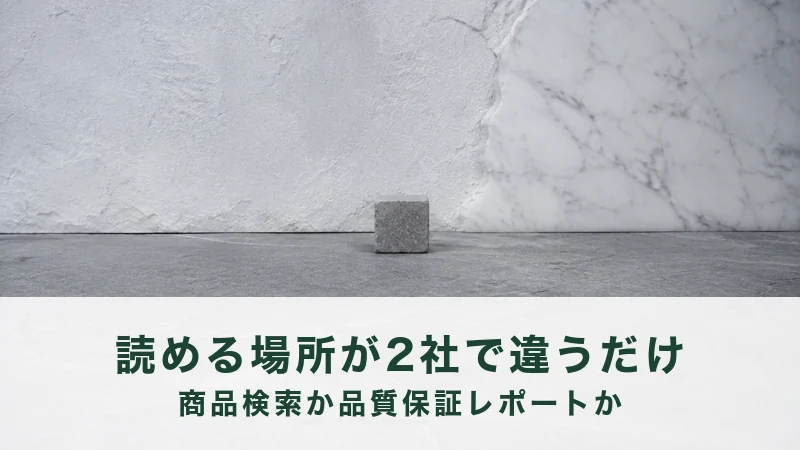 白い壁の前の灰色の床に、小さな灰色の立方体がひとつ置かれている